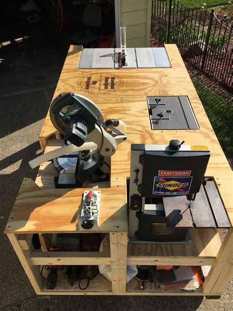 Diy table saw workbench - It’s like my new very best friend! I shared tips on customizing it to fit your own saw, but it fits my Ridgid 12″ Compound Miter saw perfectly 😉 I love the extra storage I have gained, and I especially love how my longer cuts are so much easier with the 7ft length of the miter saw station top!